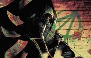 CA – Absolute Green Arrow #1 Signing | July 18th A hooded figure with glowing red eyes holds a bow in front of a brick wall marked with a green symbol, surrounded by flying blood-stained papers.