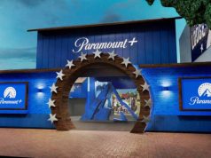 Paramount+ The Lodge returns to SDCC 2026! A blue Paramount+ building with a star-shaped archway entrance and two large screens displaying the Paramount+ logo on either side.