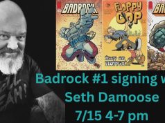 MI – Badrock #1 Signing | July 15th A man with a beard smiles next to comic book covers. Text: "Badrock #1 signing with Seth Damoose 7/15 4-7 pm.