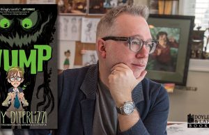 PA – An Afternoon with Tony DiTerlizzi | Oct 3rd A man sits at a desk with art supplies, looking to the side. To the left is the cover of the book “The Wump” by Tony DiTerlizzi. The Doylestown & Lahaska Bookshops logo is in the corner.